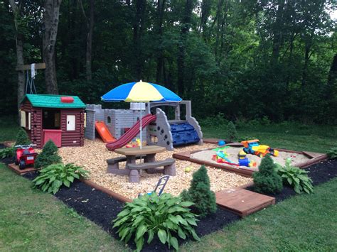 A Play Area In The Middle Of A Yard