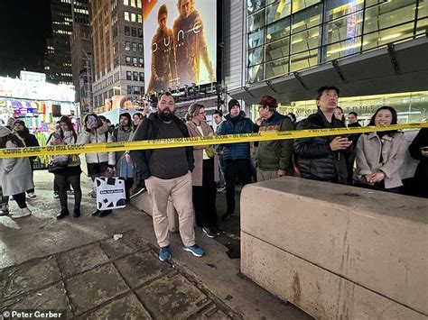 Shoplifters Open Fire On Security Guard In New York Citys Busy Times Square Hitting An Innocent