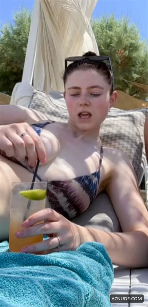 Thomasin Mckenzie In Sexy Bikini With Her Friend Lying On A Beach In