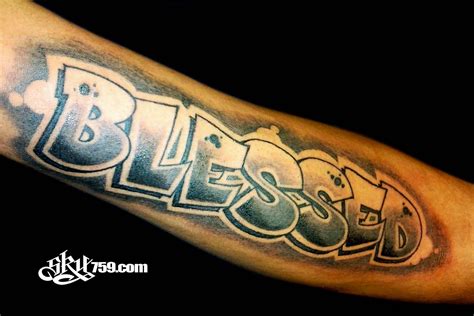 Black And Grey Shaded Blessed Tattoo On Forearm