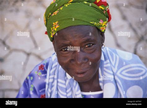 Portrait Of An African Woman Standing In Dry River Bed Burkina Faso