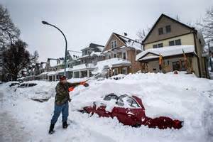 Thomas Wisniewki Digs His Car Out Of Snow Following A Massive Snow