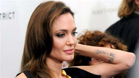 Sacred Fearless Angelina Jolie Tattoo Designs And Meanings 2019