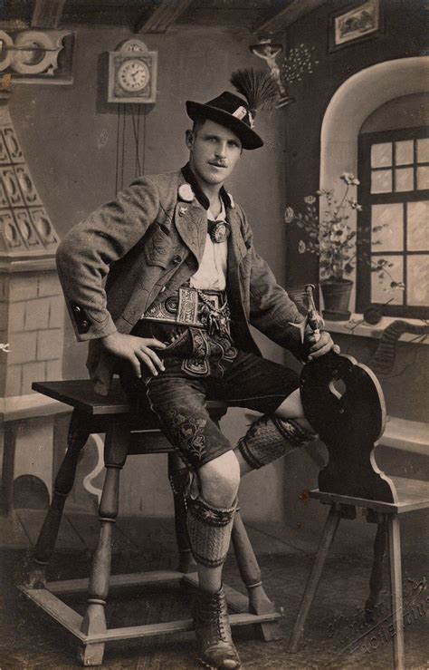 A Man Wearing A Traditional German Outfit Lederhosen Vintage Men