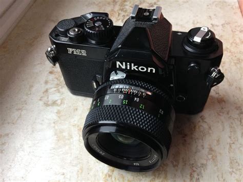 Nikon Fm2 Black Body Serial No N 7537495 With Zessan 128 Catawiki