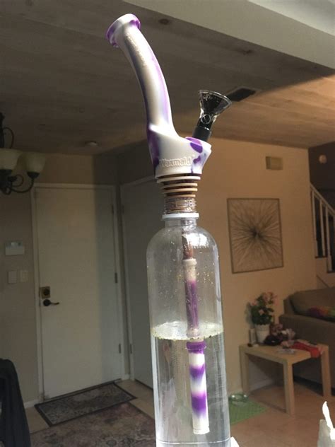 Take your bottle and mark where you want to put your downstem. How To Make A Water Bottle Bong | Glass Nation