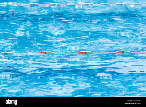 Close Up Of Swimming Pool Lane Divider Line On A Bright Sunny Day