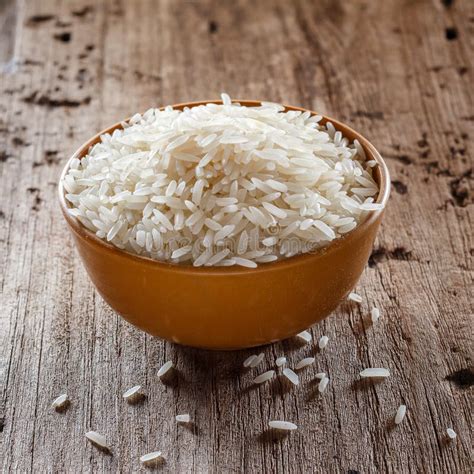 Uncooked Dry Rice In Brown Bowl Stock Photo Image Of Brown Cuisine