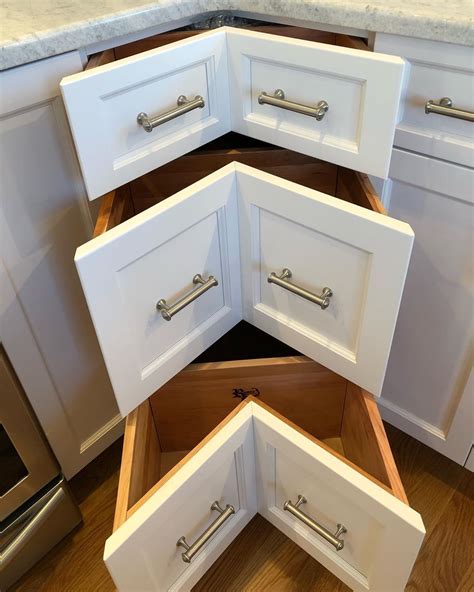 Corner cabinet solution weird yet oddly awesome corner drawers. Russo Woodworking Inc on Instagram: "Don't like lazy Susan ...