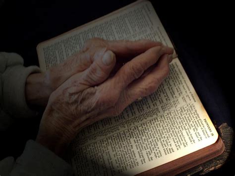 Praying Hands On Bible Free Stock Photo By David Hensen On