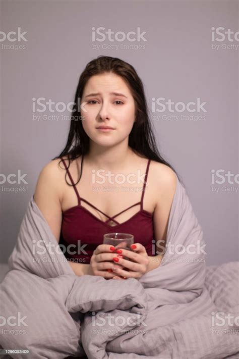 Charming Sleepy Brunette Girl Burst Into Tears In Bed With Grey Bed