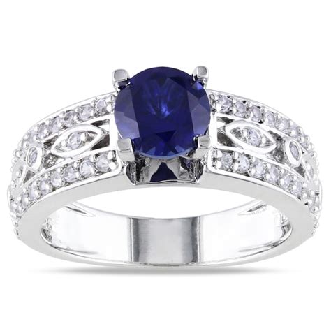 Shop Miadora Sterling Silver Created Blue And White Sapphire Infinity