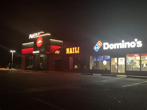 My Town Has A Dominos And A Pizza Hut Right Next To Each Other With A Nail Salon Acting As Their