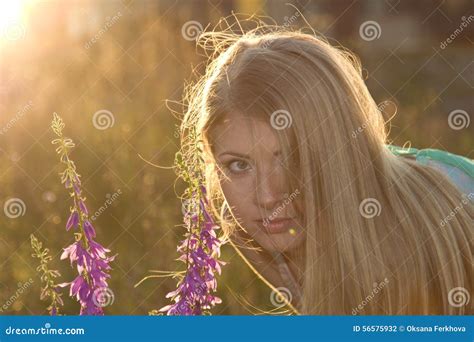 Beautiful Blonde And Flowers At Sunset Stock Photo Image Of