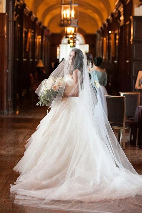 Gorgeous Bride In Her Ballgown Wedding Dress And Cathedral Length Drop