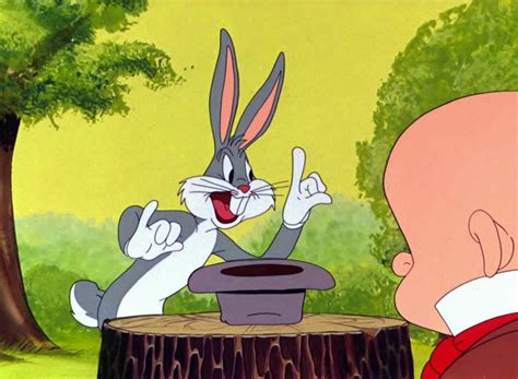 An Animated Image Of A Man And Rabbit Sitting At A Table In Front Of A