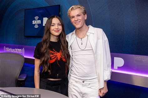 Olivia Rodrigo Bares Her Toned Midriff In A Cropped Sweater On A Visit