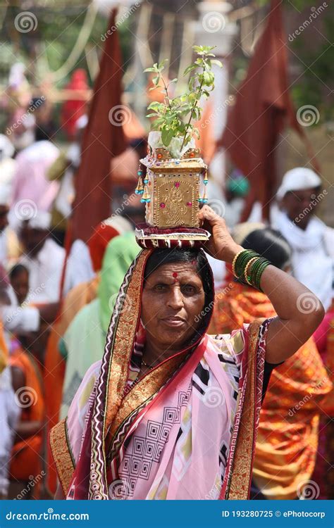 Woman Carrying Tulsi Plant During Shree Dnyaneshwar Maharaj Palki Pune