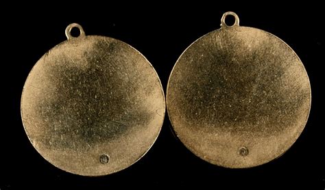 Two 14k Gold Medallions