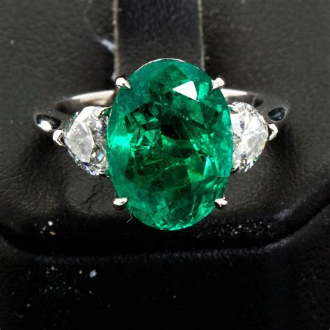 2.04 carat psapphire, oval gemstone. Oval Colombian Emerald Diamond Hearts Side Stones ...