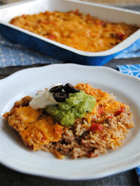 Sprinkle top with parmesan cheese. Pork Taco Rice Casserole - Pork Recipes - Pork Be Inspired