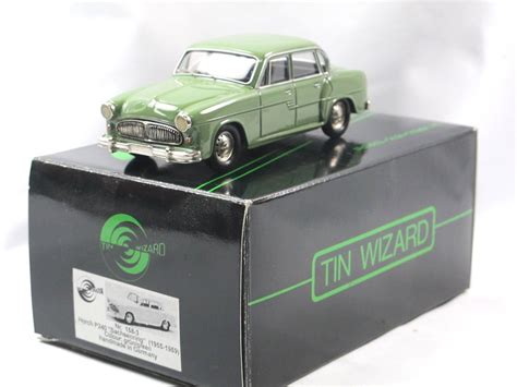 The early preproduction models can be identified by the grill, which is divided in two and has vertical bars. Tin Wizard 1955 Horch P240 Sachsenring grün Weißmetall 1 ...
