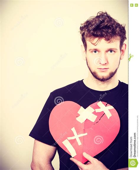 Sad Man With Glued Heart By Plaster Royalty Free Stock Photo