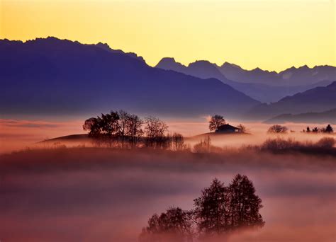 Free Photo Misty Mountains Landscape With Building And Trees