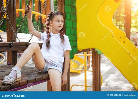 Lovely Girl At The Playground Stock Photo Image Of Child Pigtails