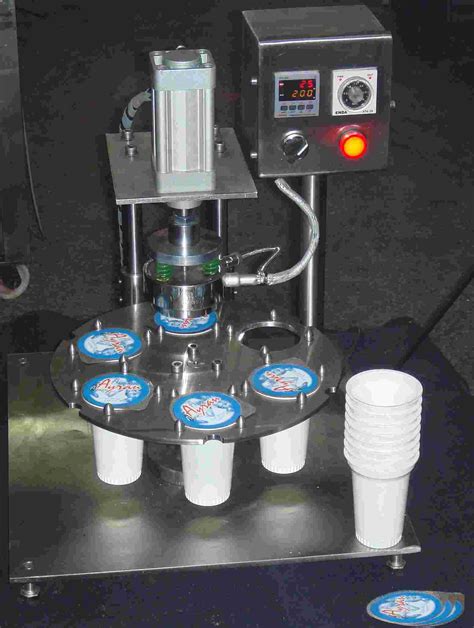 semi manual cup sealing machine  asil machinery  sti turkey