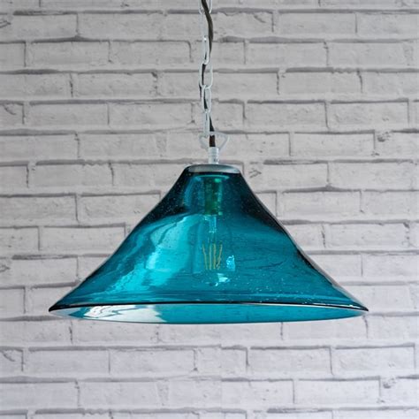 This Turquoise Coloured Masterpiece Is Hand Blown And Very Bubbly And