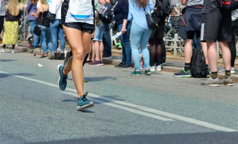 Marathon Running Race Woman Runner Feet On Road Racing Sport