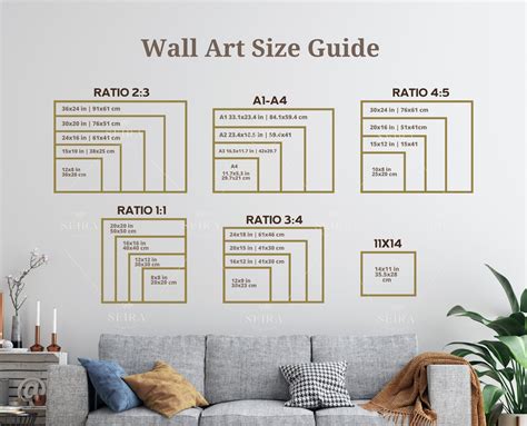 The Wall Art Size Guide Is Shown In Gold On A White Wall Above A Gray Couch