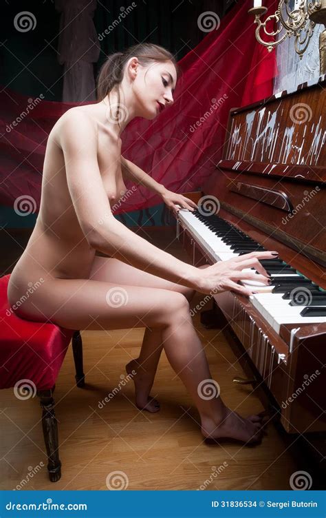 Playing The Piano In Nude