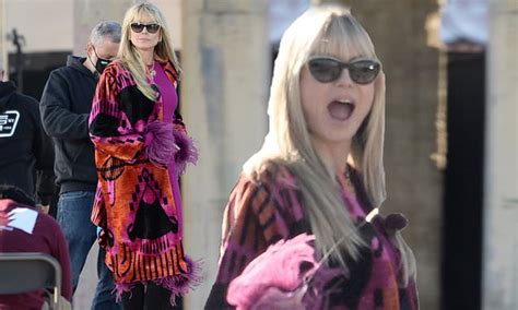 heidi klum flaunts her sense of style in a colorful coat on set of germany s next top model in la