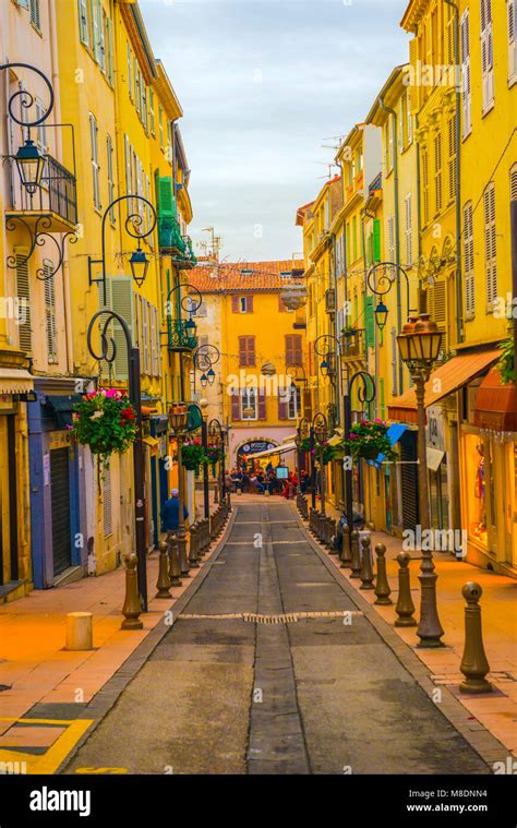 Narrow Street In Old Town With Street Lamps In Menton In Provence Alpes