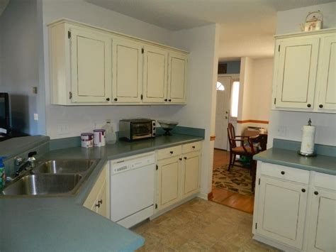 Painting cabinets is a messy job, and the last thing you want is paint all over your countertops as you learn how to paint kitchen cabinets. Painted kitchen cabinets. What a difference!! Still have ...