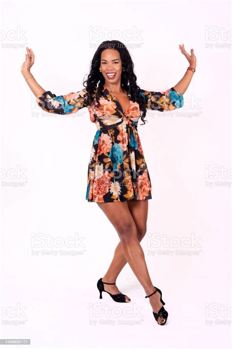 Mulatto Woman Smiling A Lot Dancing On A White Background Cuban Traditional Dance Full Shot