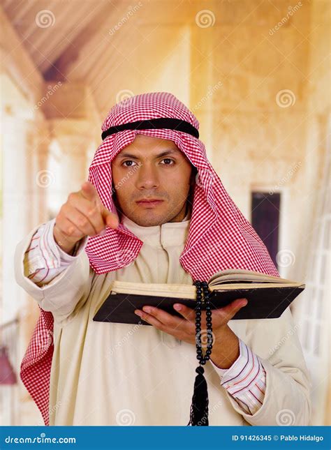 Adult Muslim Man Is Reading The Koran Stock Image Image Of Clothing