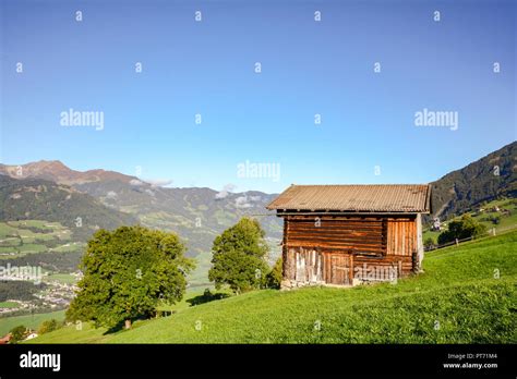Alpine Pasture Hike To An Old Wooden Barn With Mountain Meadow In The