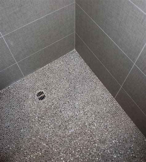 Check out part one of our bathroom floor progress here. Pebble tiles, Tile and Recycled glass on Pinterest