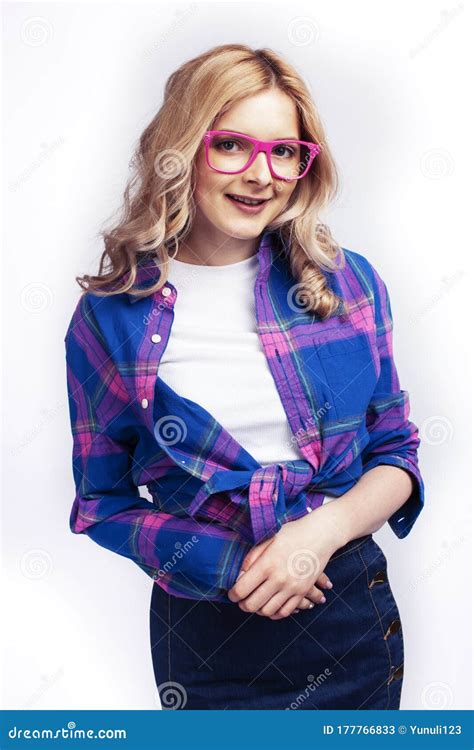 Young Pretty Blond Teenage Hipster Girl In Glasses Posing Emotional