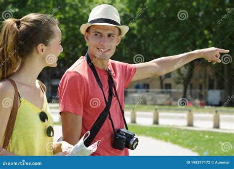 Boyfriend Pointing At Sight Stock Photo Image Of Direction Hand