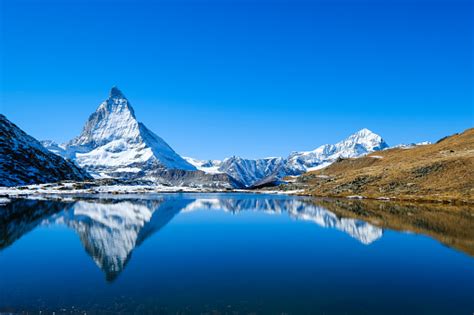 Reflection Of Matterhorn In Lake During Autumnzermatt Switzerland Stock