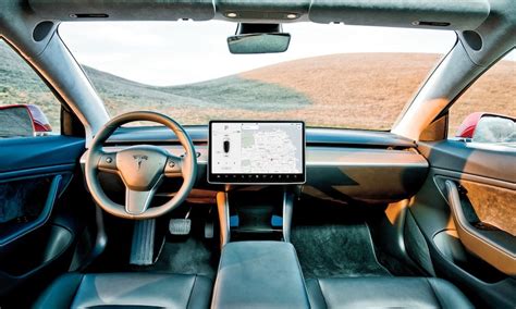 The model 3's interior is dominated by a large screen, which serves as the sole display and control panel. Tesla Adds 'Limited' Range of New Siri Commands for Model ...