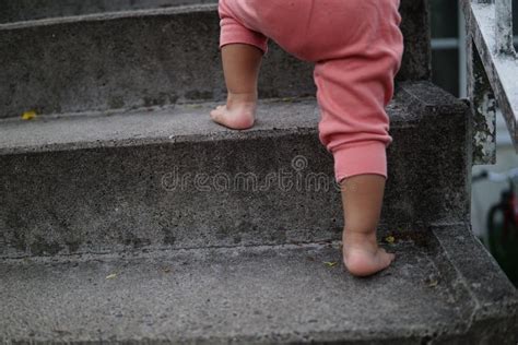 Shot Of Baby Feet Climbing Stairs Stock Image Image Of Stairs Climb