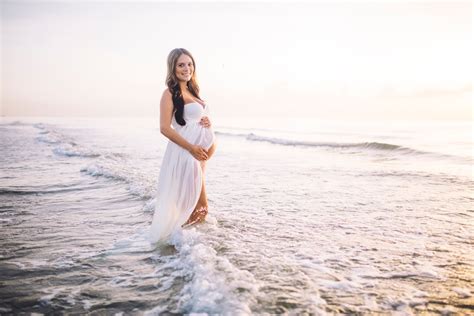 laura and co maternity photoshoot beach sunrise look