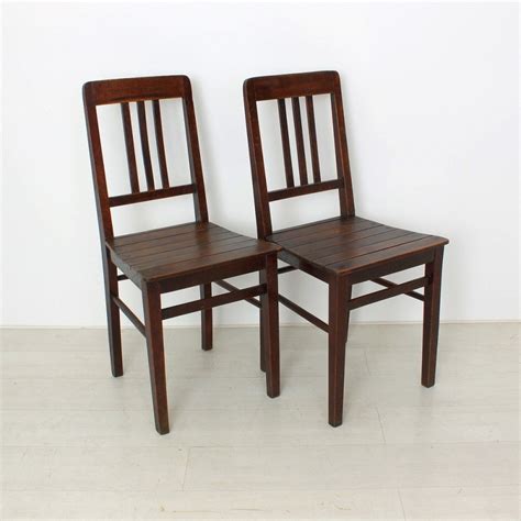 When a design become truly iconic. Vintage Wooden Chairs, 1920s, Set of 2 for sale at Pamono