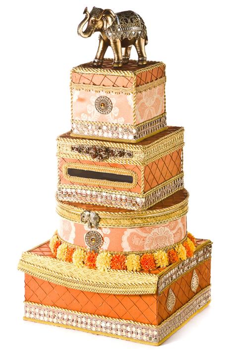 Looking for sending rakhi to mumbai, bangalore, delhi or any city in india? Orange and gold East Indian wedding card box | Card box wedding, Wedding cards, Money box wedding