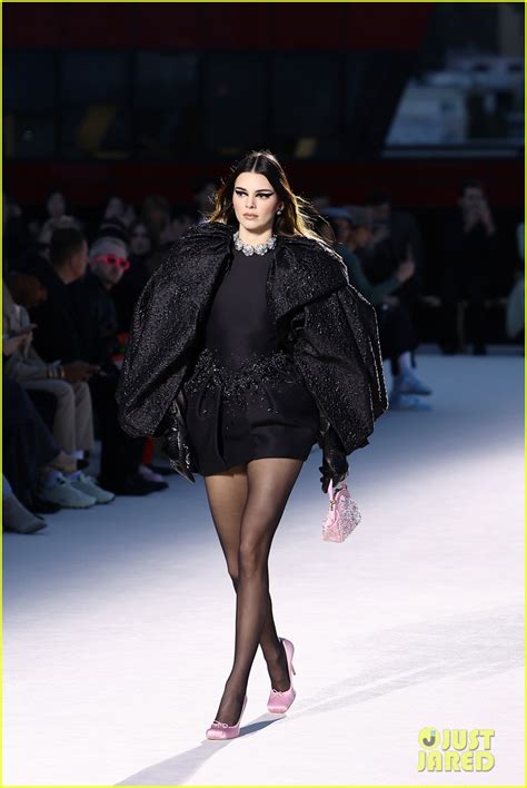 Gigi Hadid Wears Sheer Corseted Dress While Walking In Versace Fashion